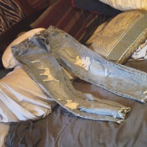 Distressed high rise ankle jeans